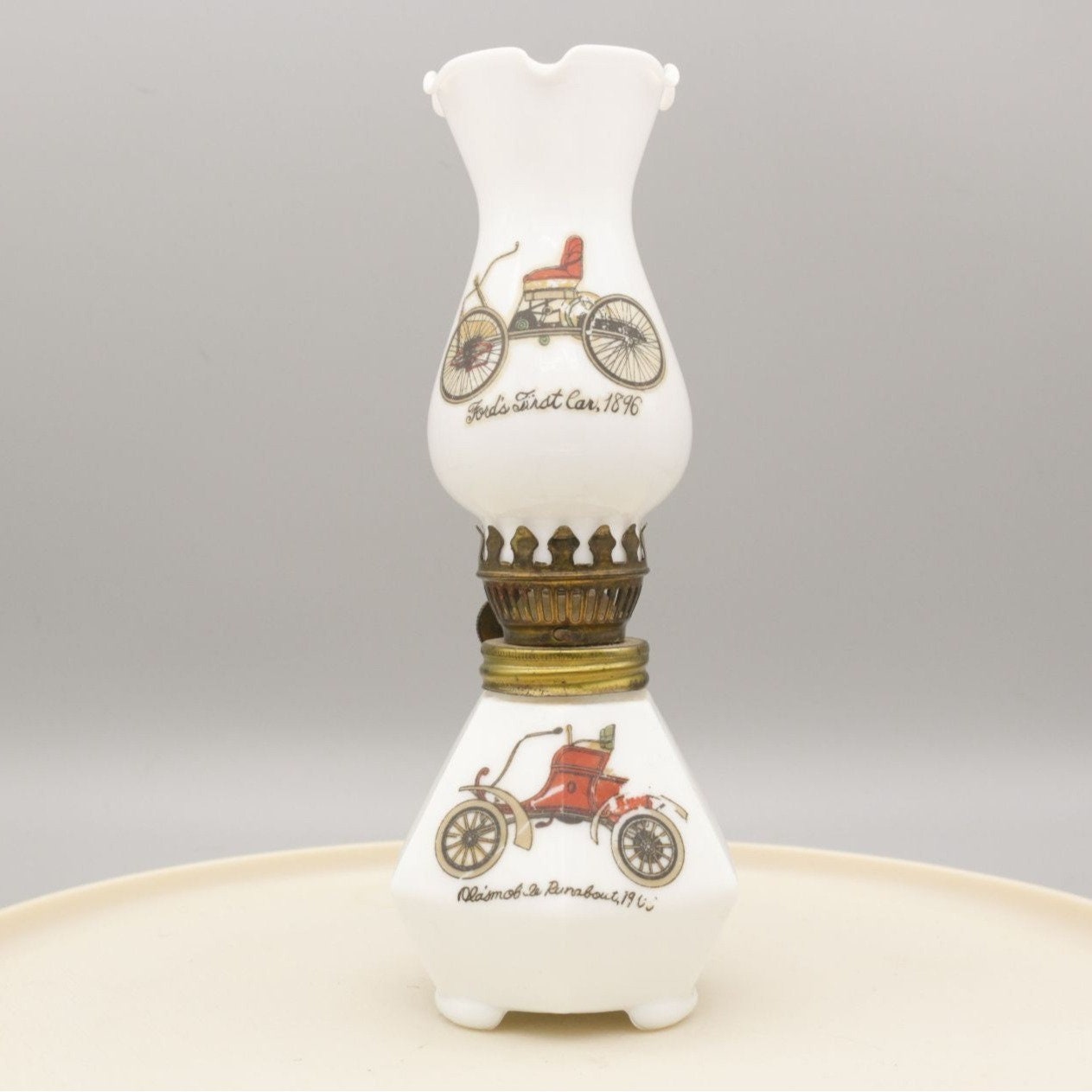 Vintage Milk Glass Oil Lamp Small 7.5" With Vehicle Motifs AS IS
