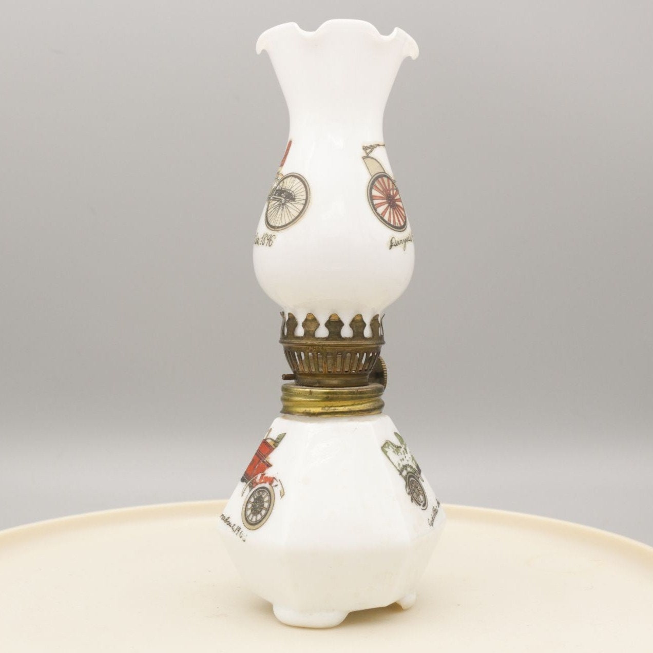 Vintage Milk Glass Oil Lamp Small 7.5" With Vehicle Motifs AS IS